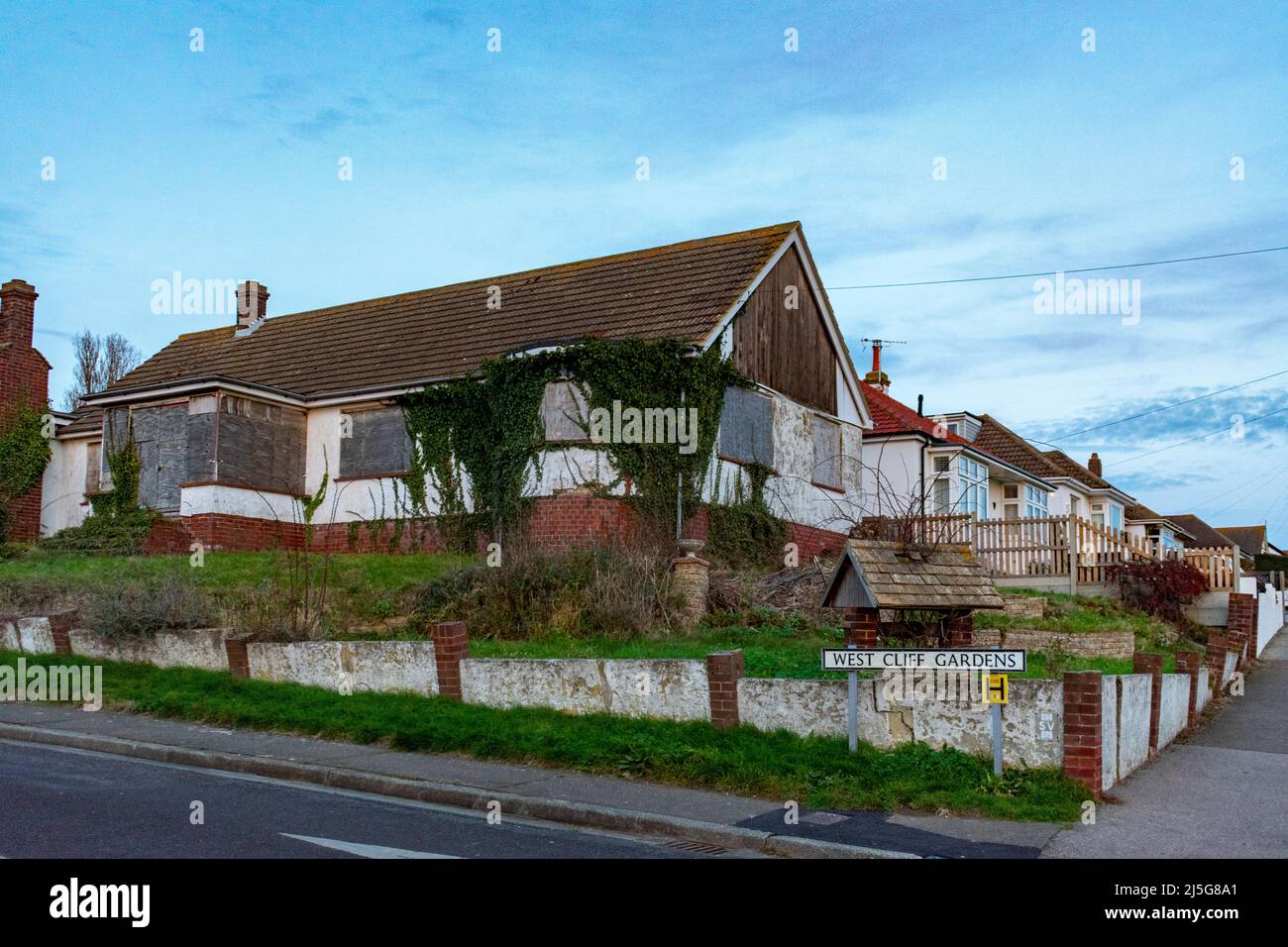 A derelict and abandoned house at the end of Westcliff Gardens, Herne Bay, Kent, UK. Stock Photo