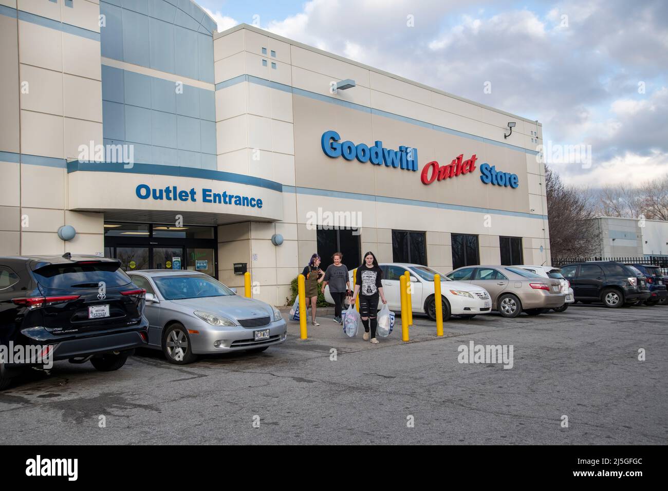 Women leaving the Goodwill outlet store in Kansas City, Missouri with