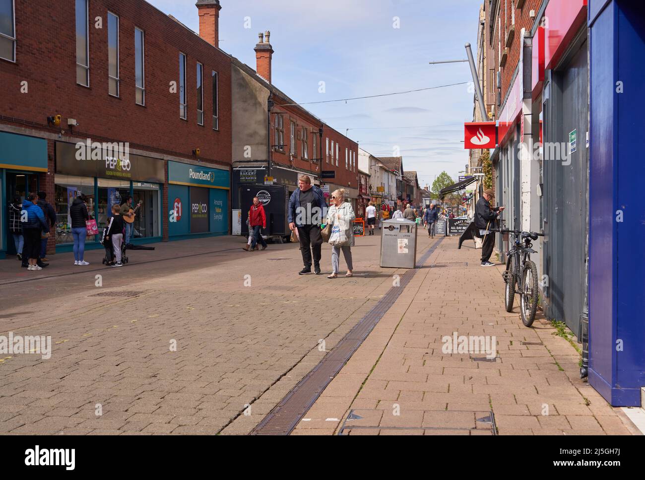 Shoppers on a high street in Loughborough, Leicestershire, UK Stock ...