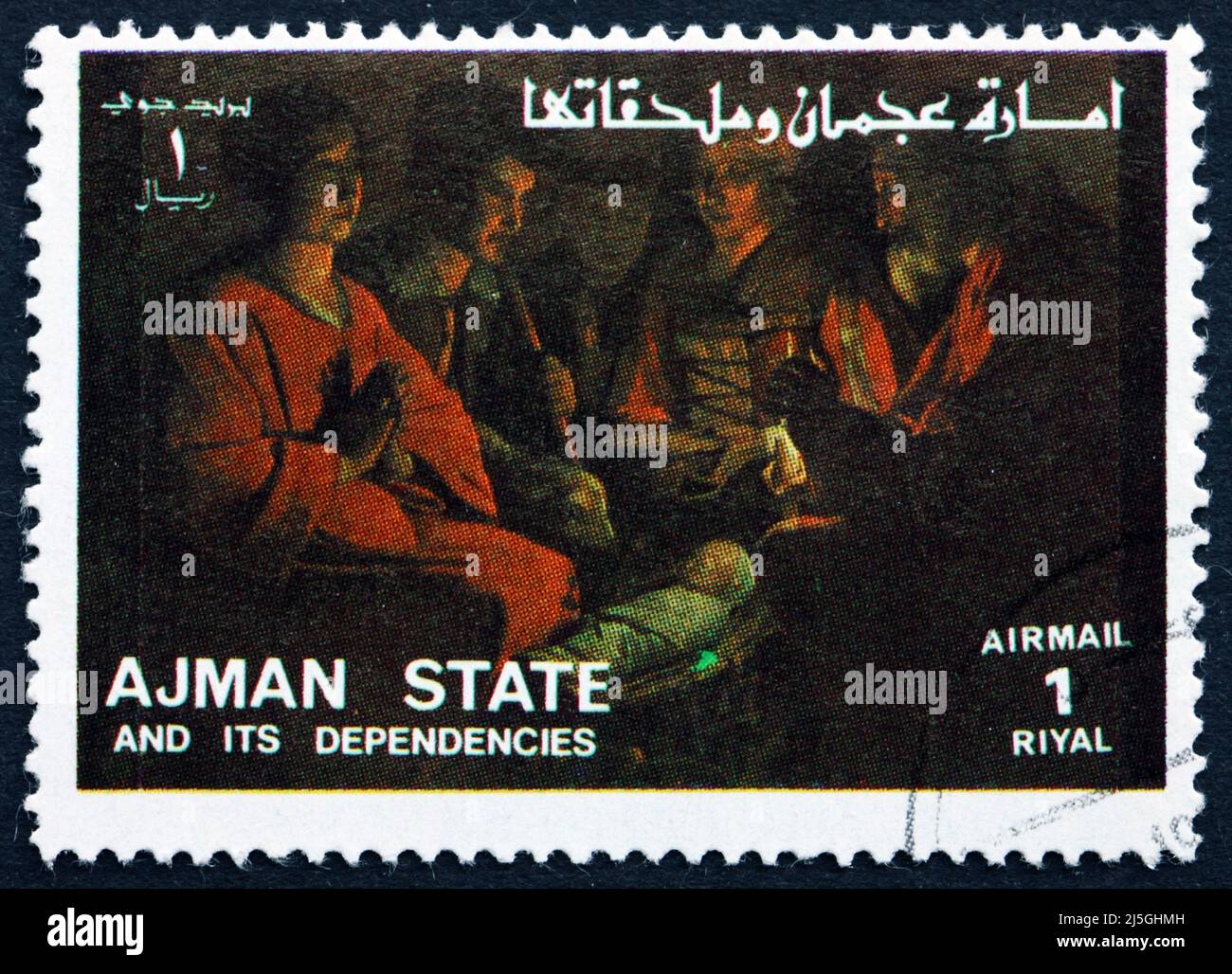 AJMAN - CIRCA 1973: a stamp printed in the Ajman shows Adoration of the Kings, Life of Jesus, circa 1973 Stock Photo