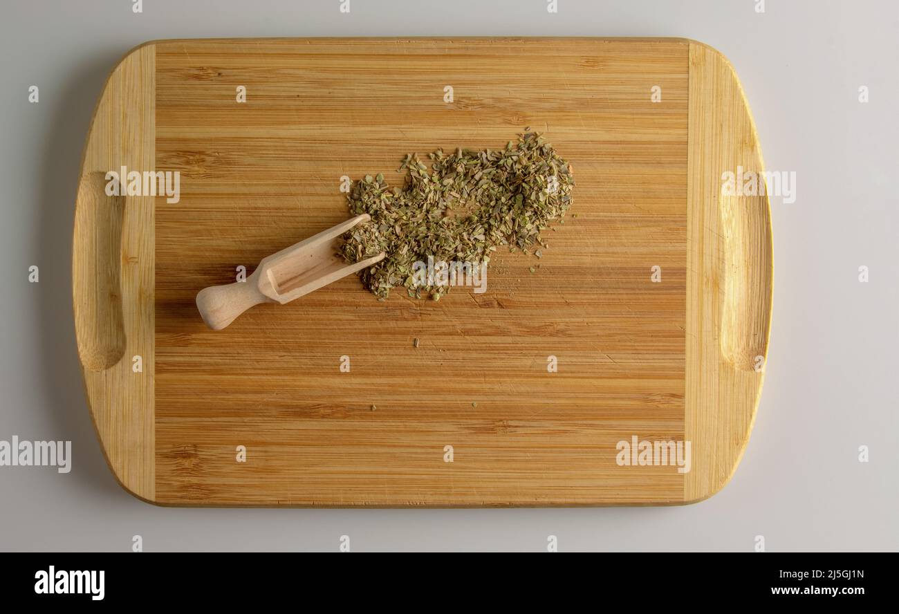 Spice oregano or marjoram. Aromatic spice for food. Background of dried