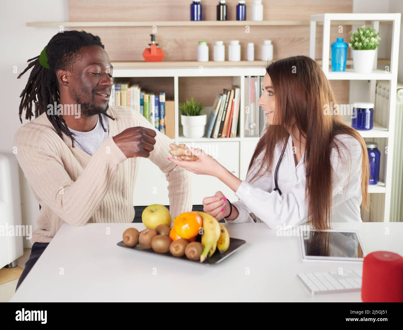 Young asian nutritionist eating an apple hi-res stock photography and ...