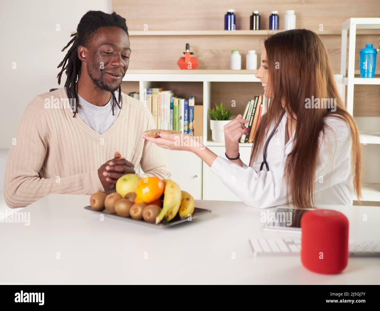 Young asian nutritionist eating an apple hi-res stock photography and ...