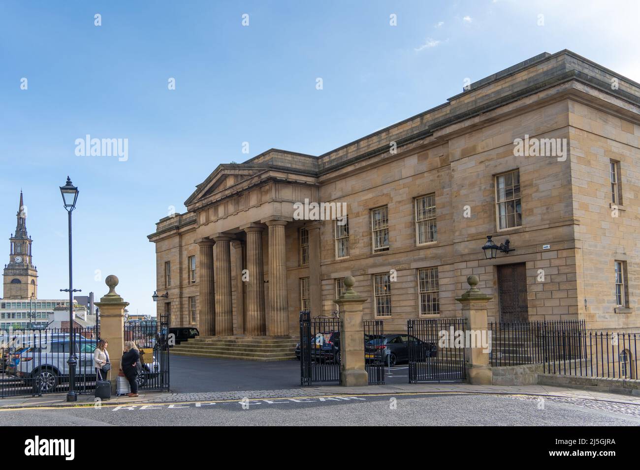 The Doric columns of the Moot Hall old court house, Newcastle upon Tyne, UK, with All Saints