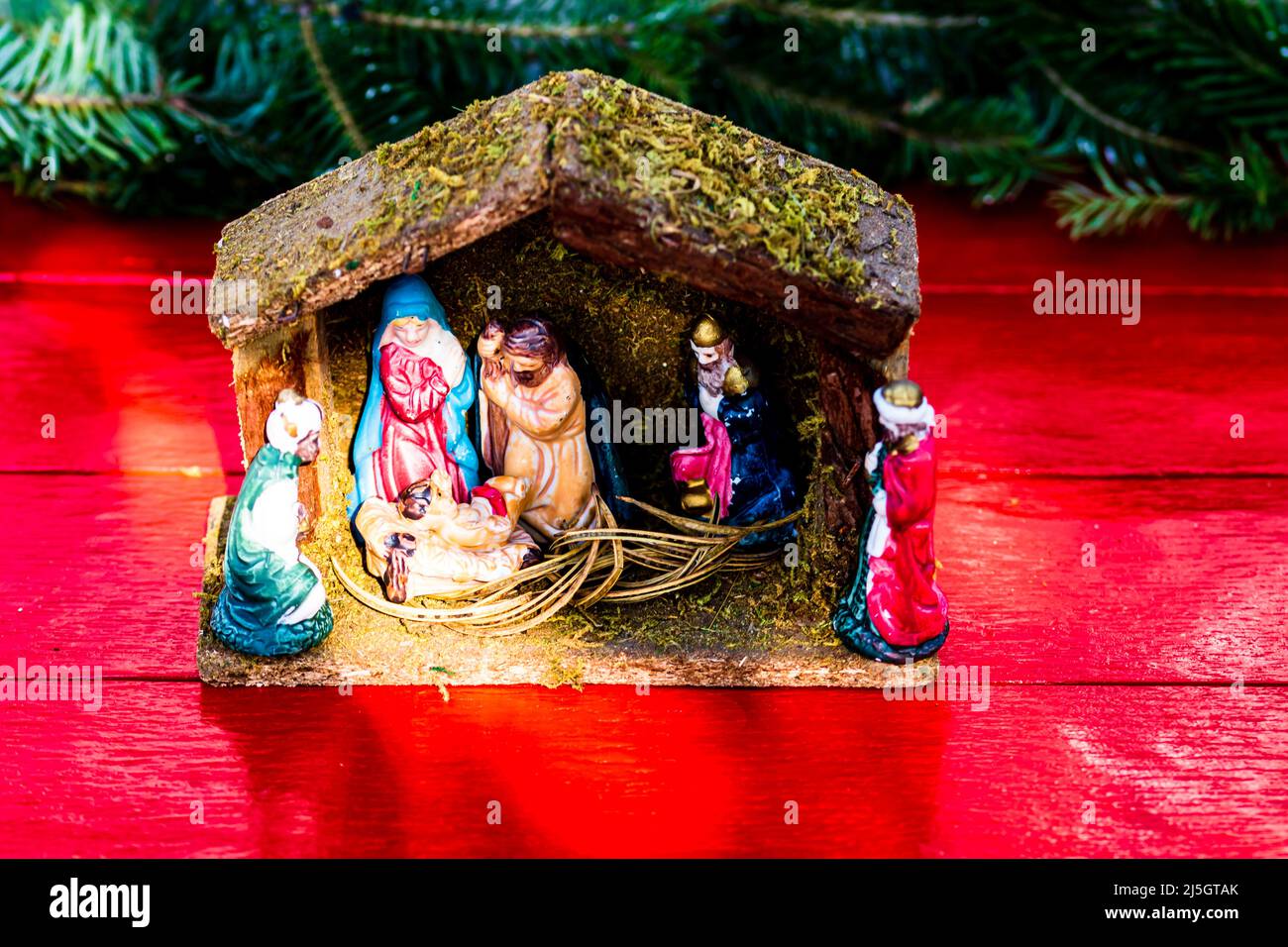 Colorful Nativity Scene with baby Jesus against Christmas background ...