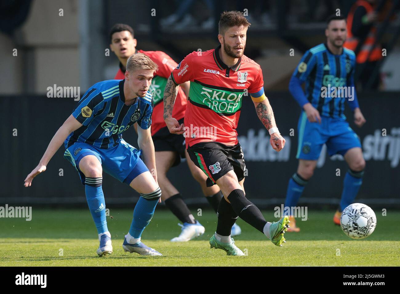 NIJMEGEN - (lr) Kenneth Taylor of Ajax, Lasse Schone of NEC during the Dutch Eredivisie match between NEC and Ajax at De Goffert stadium on April 23, 2022 in Nijmegen, Netherlands. ANP JEROEN PUTMANS Stock Photo