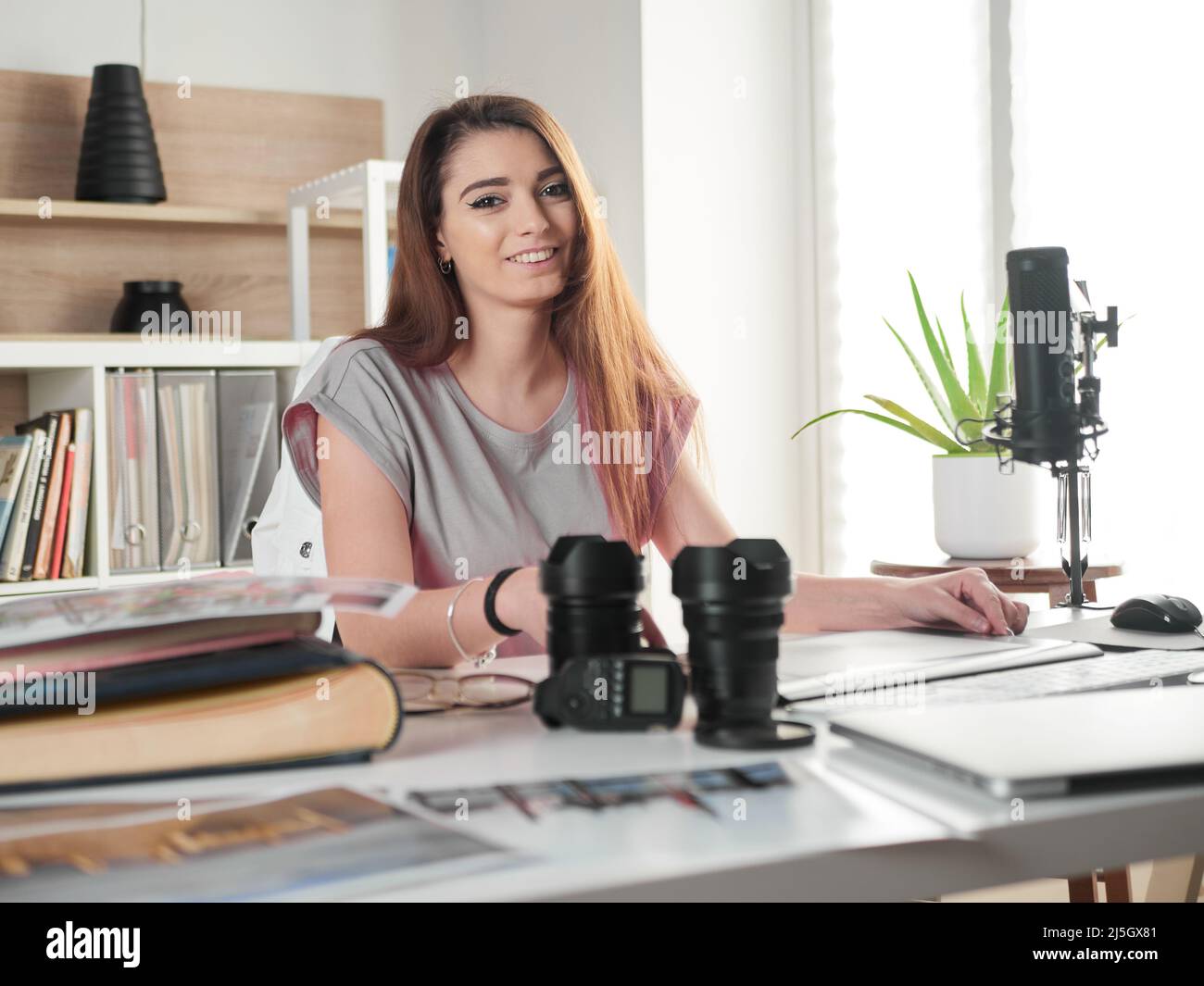 Graphic designer photographer working in home office Stock Photo Alamy