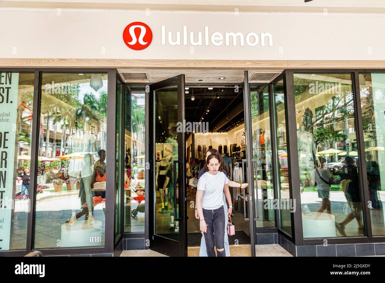 Miami Florida Coral Gables Shops at Merrick Park upscale outdoor shopping mall outside exterior entrance Lululemon Athletica athletic apparel Stock Photo