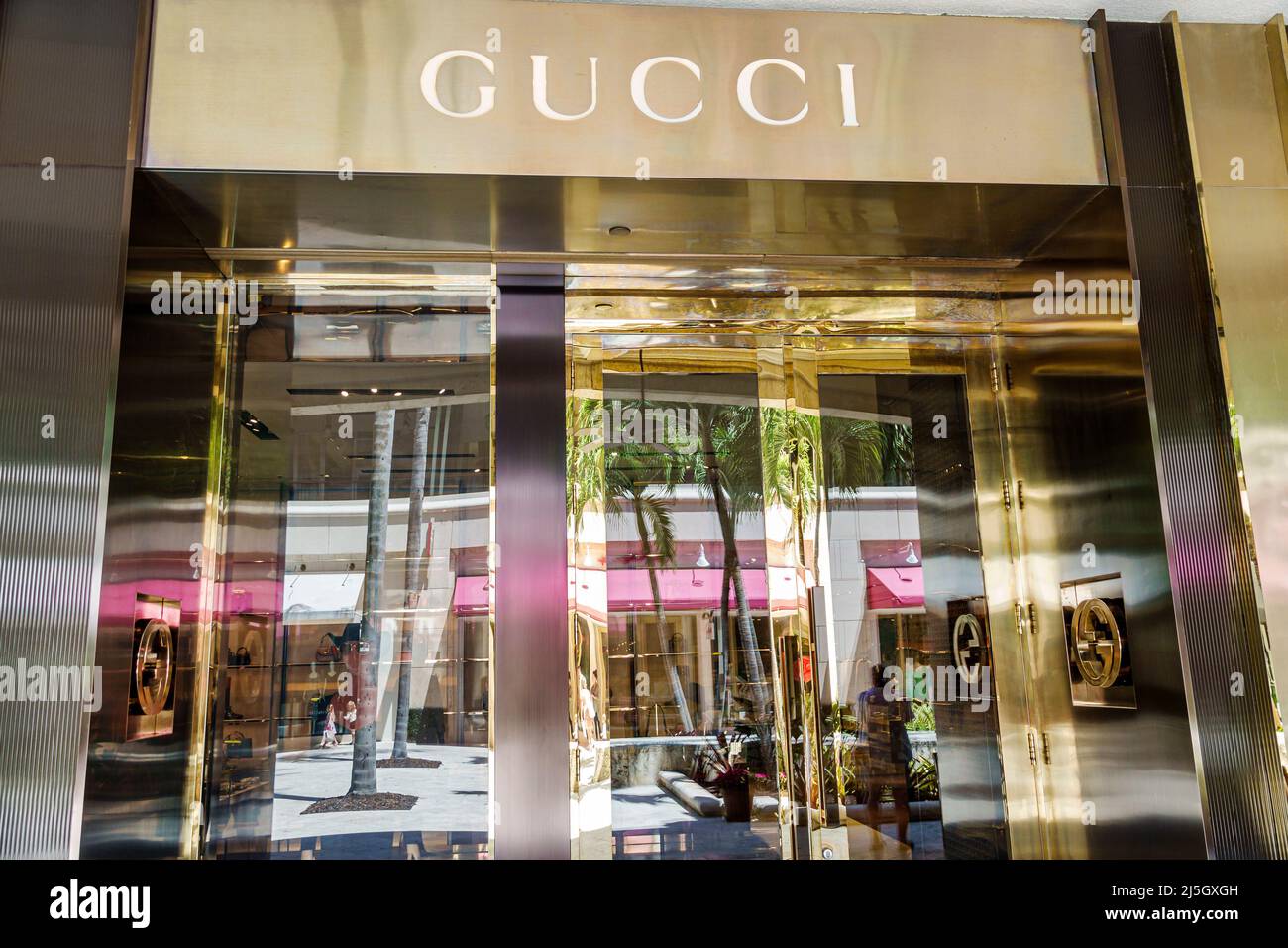 Miami Florida Coral Gables Shops at Merrick Park upscale outdoor shopping mall outside exterior entrance Gucci store Stock Photo