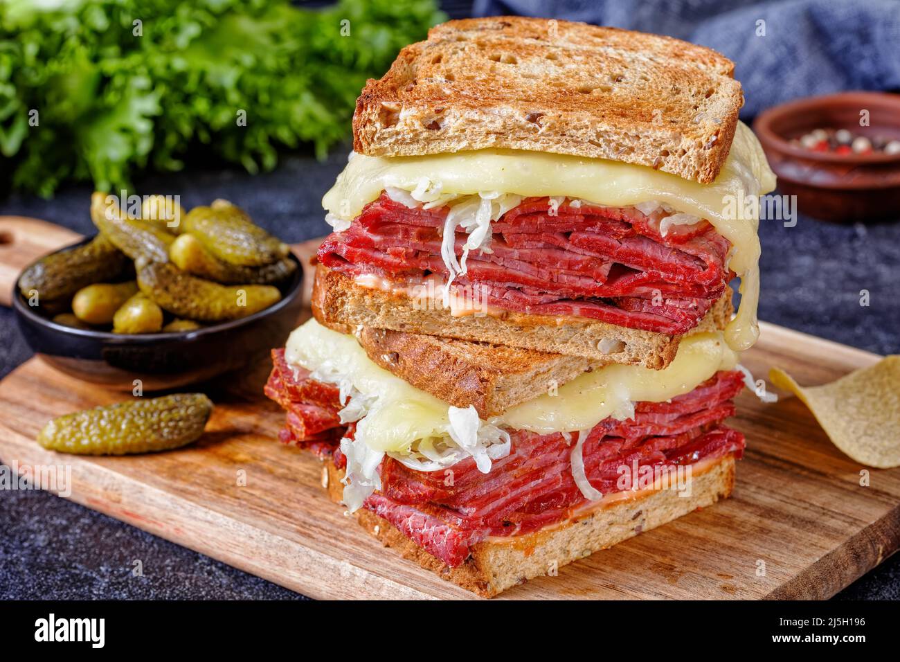 reuben sandwich with rye bread thinly sliced corned beef, sauerkraut