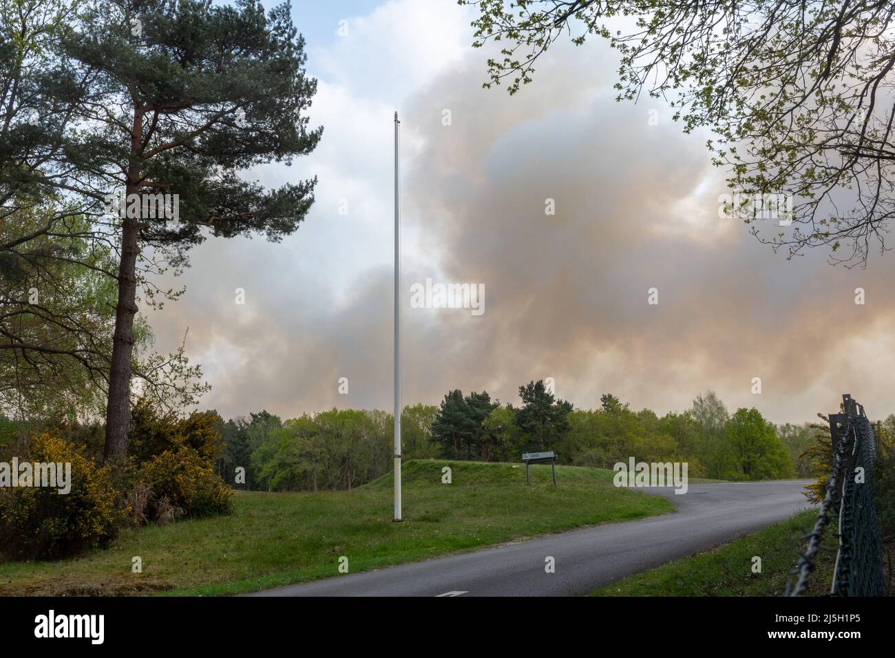 Ash Ranges, Surrey, England, UK. 23rd April 2022. A large heath fire has broken out on Ash Ranges, which a heathland nature reserve west of Pirbright in Surrey. It is owned by the Ministry of Defence and managed by the Surrey Wildlife Trust. Stock Photo