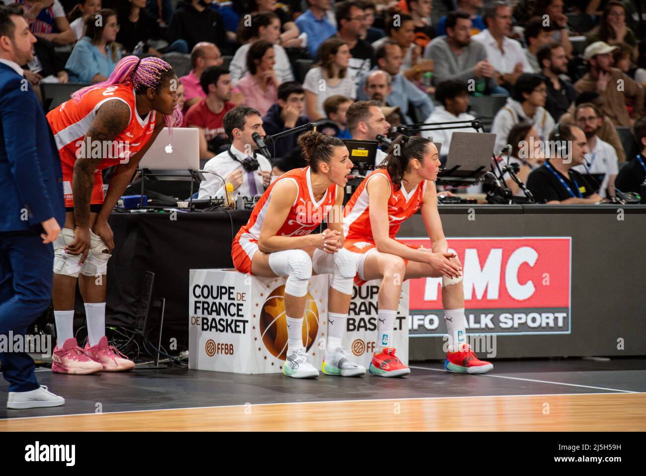 Laetitia Guapo of Tango Bourges Basket and Sarah Michel of Tango Bourges  Basket cheer up teammates during the Women's French Cup, Final basketball  match between Basket Landes and Bourges Basket on April