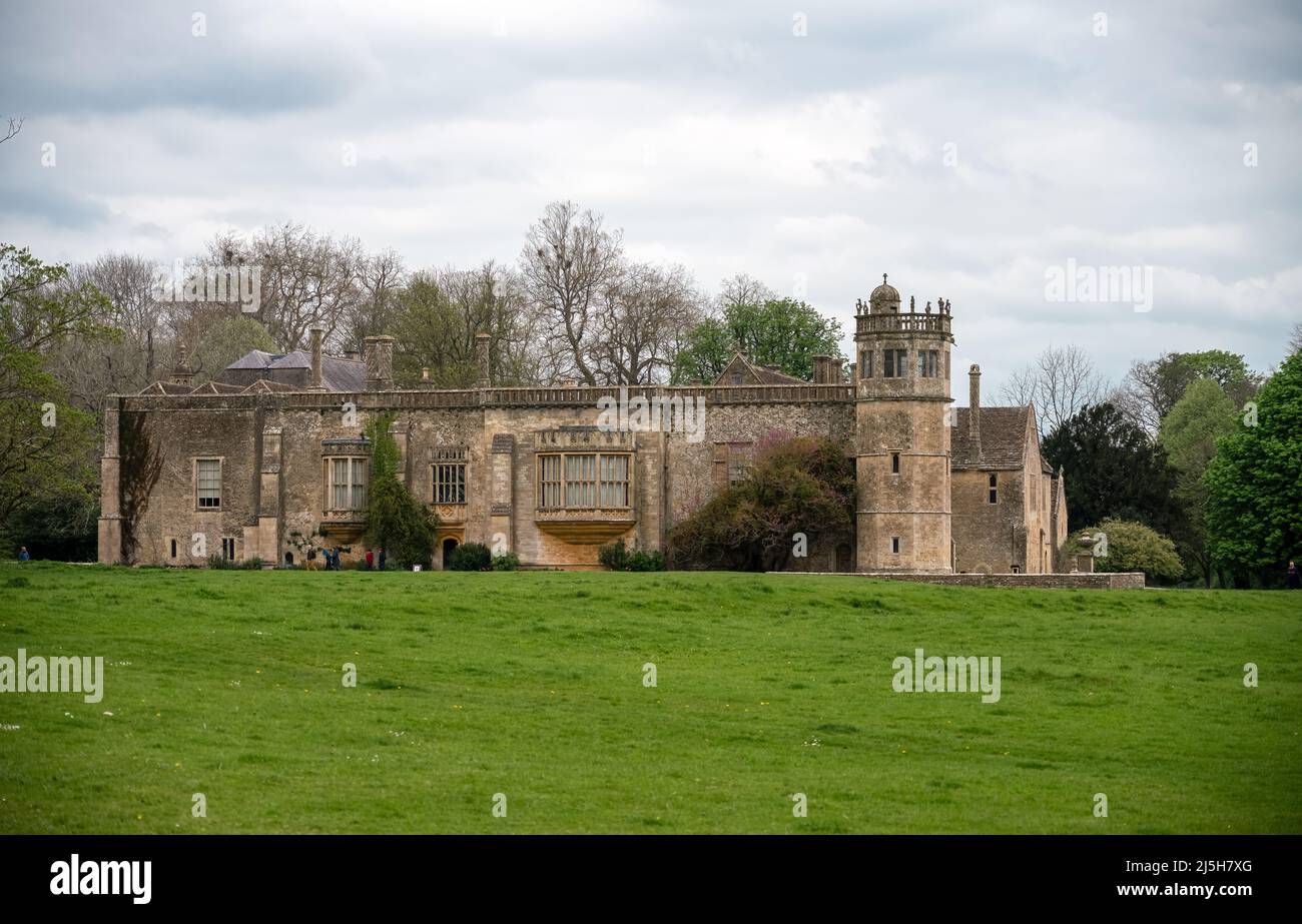 View across the lawn of 13th Century Lacock Abbey, Wiltshire Stock Photo