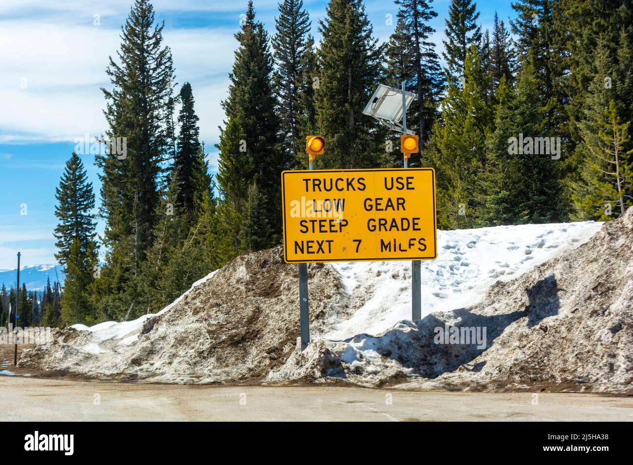 Trucks Use Low Gear Steep Grade Road Sign in the Mountains Stock Photo