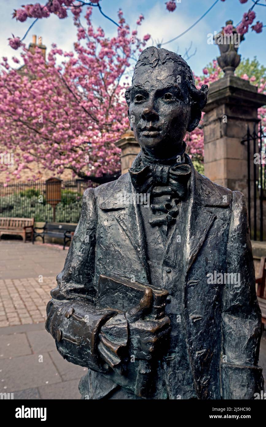 Statue in memory of the Scottish poet Robert Fergusson (1750-74) outside Canongate Kirk in Edinburgh. Stock Photo
