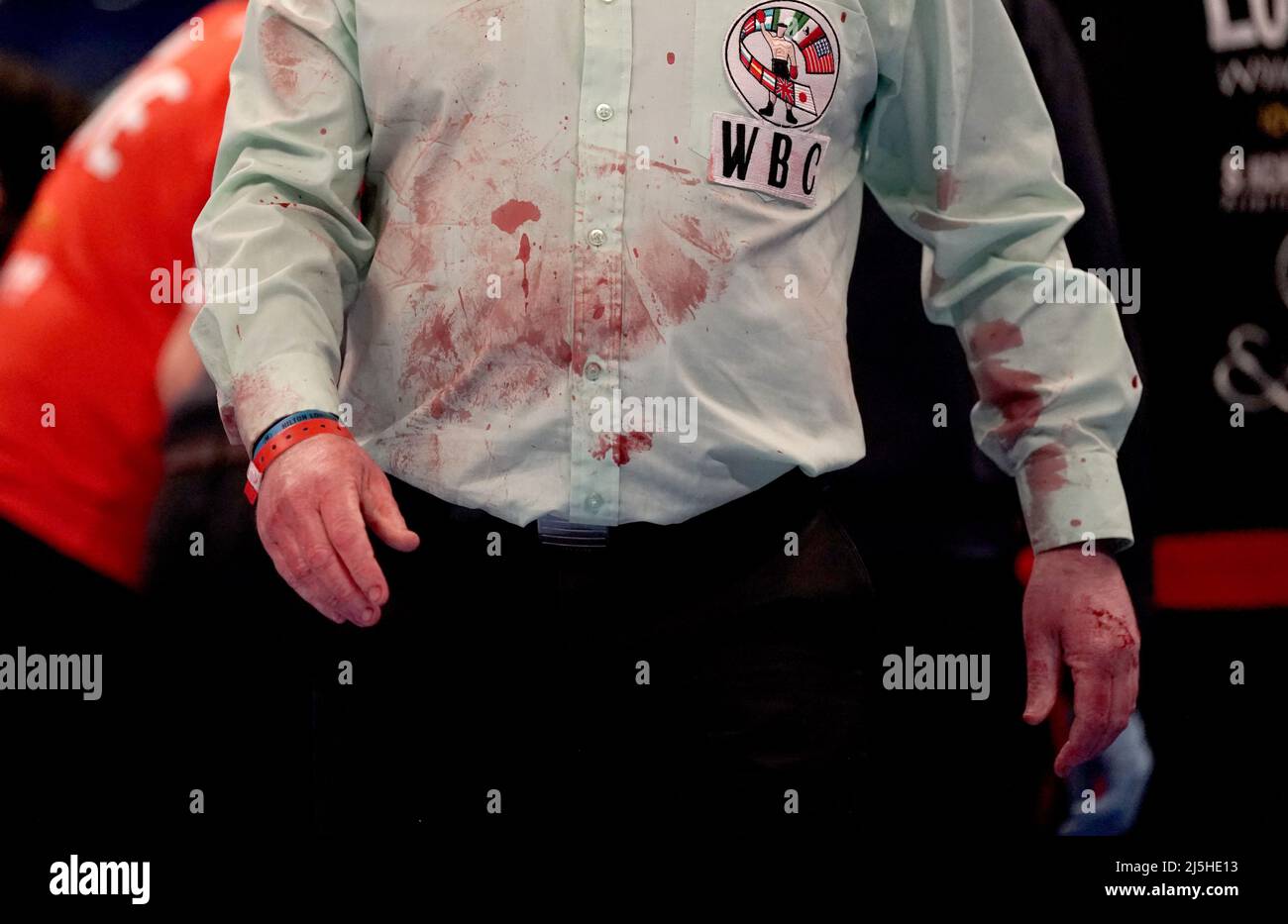 Blood on the shirt of the referee after the WBC Silver Featherweight