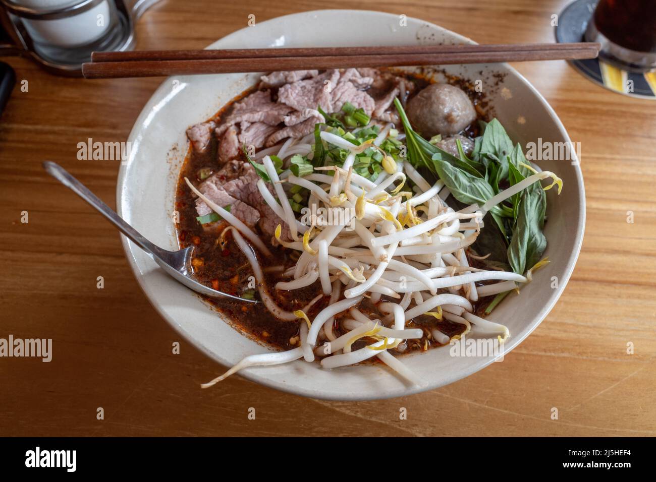 Thai style noodle soup. Thai Boat noodle soup, with beef, meat ball and