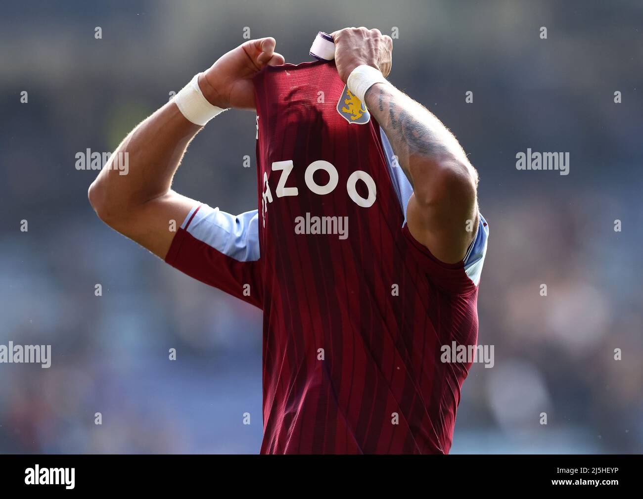 Leicester, England, 23rd April 2022.   Tyrone Mings of Aston Villa takes off his shirt after the Premier League match at the King Power Stadium, Leicester. Picture credit should read: Darren Staples / Sportimage Stock Photo