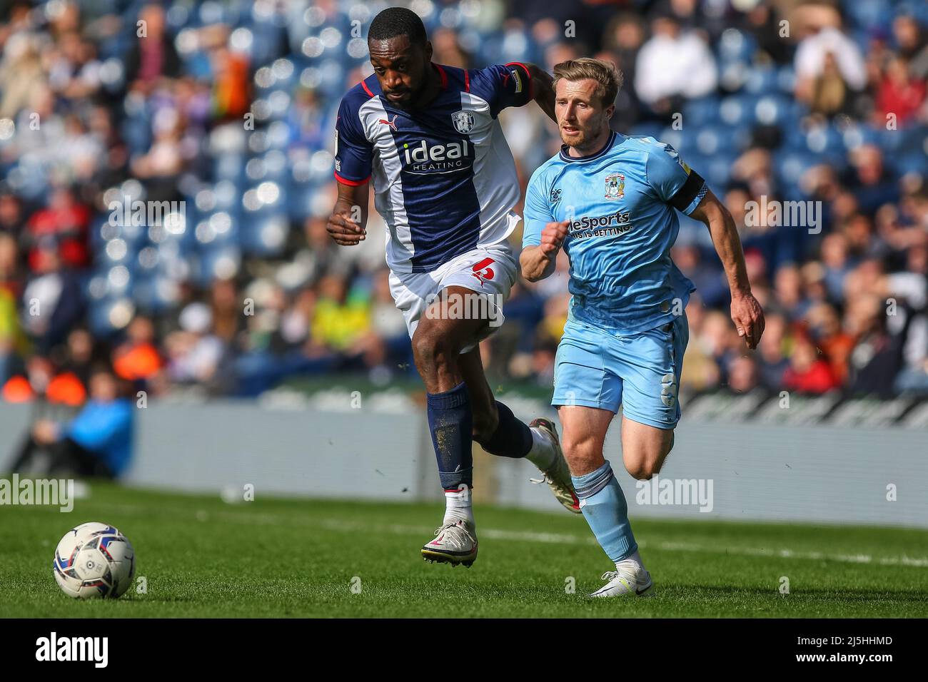 West Bromwich, UK. 23rd Apr, 2022. Jamie Allen #8 of Coventry City and Semi  Ajayi #6 of West Bromwich Albion run to get to the ball first in West  Bromwich, United Kingdom