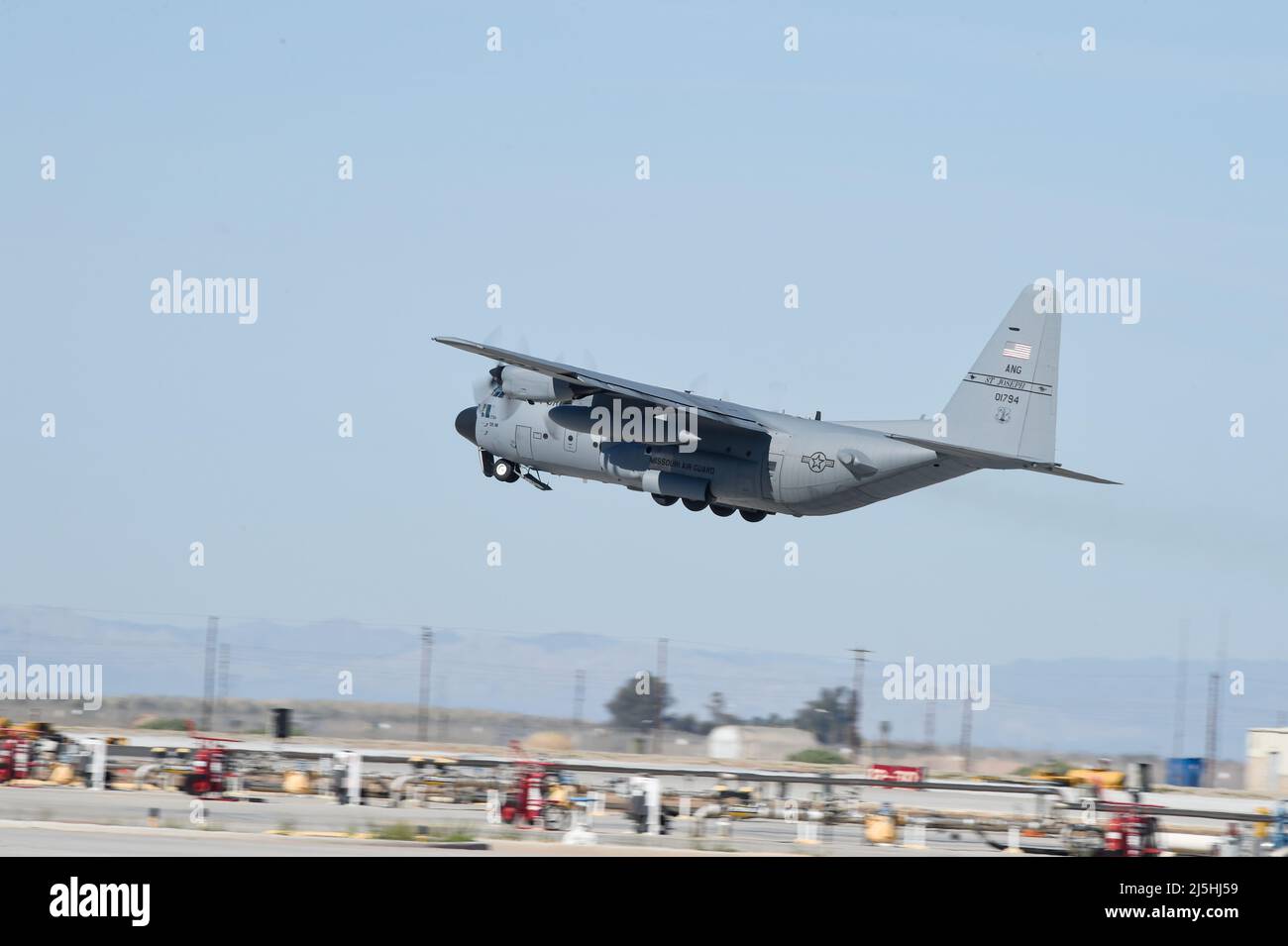 C-130J from Missouri ANG takes off at NAF El Centro in California Stock Photo