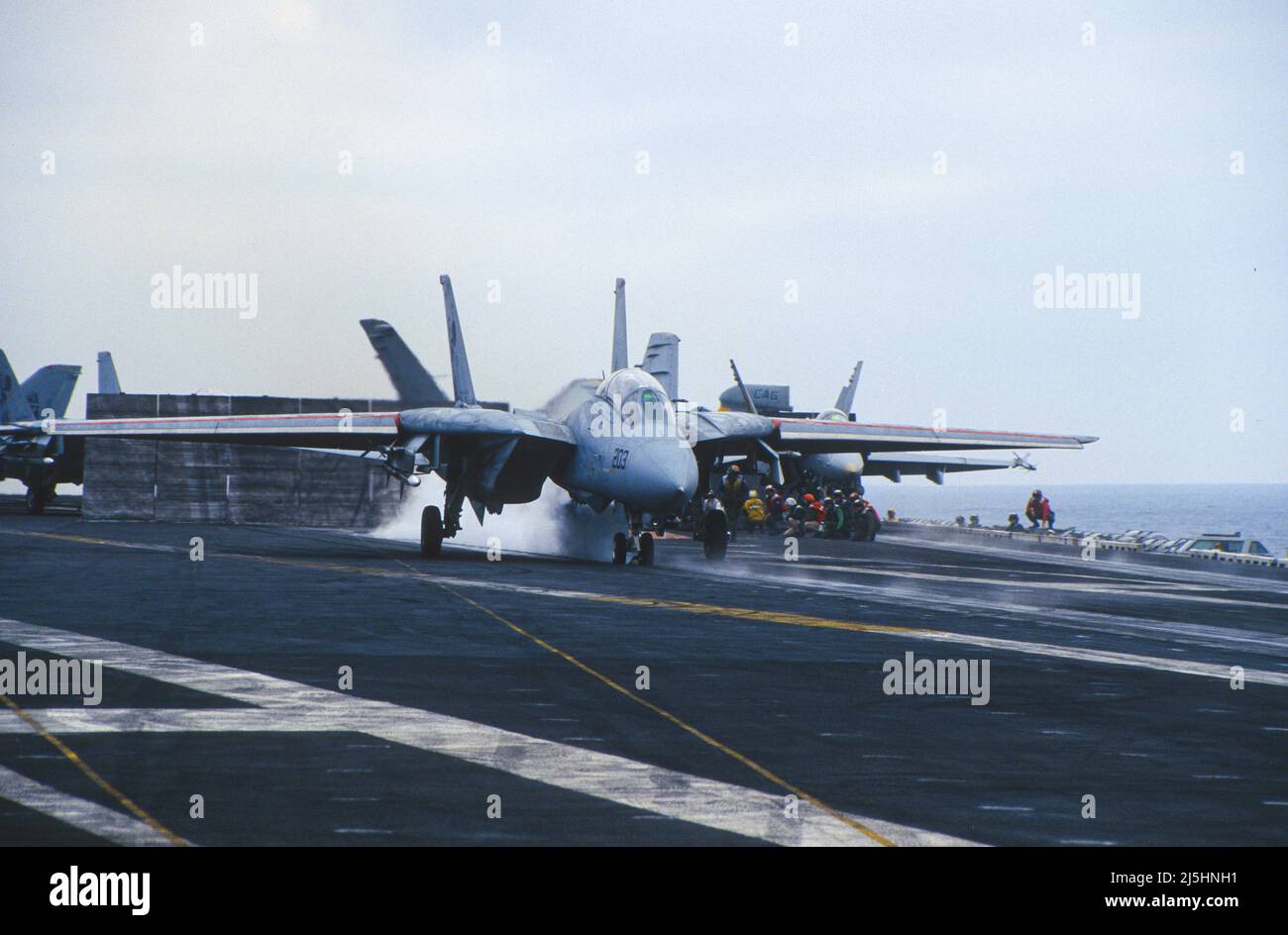 F-14 Tomcat takes off from aircraft carrier Stock Photo