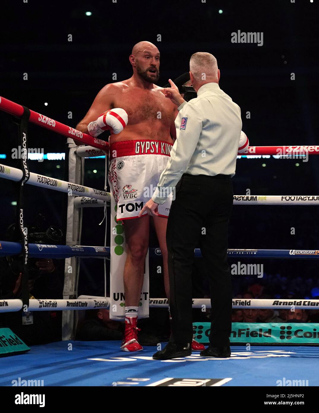 Tyson Fury with referee Mark Lyson during his WBC heavyweight