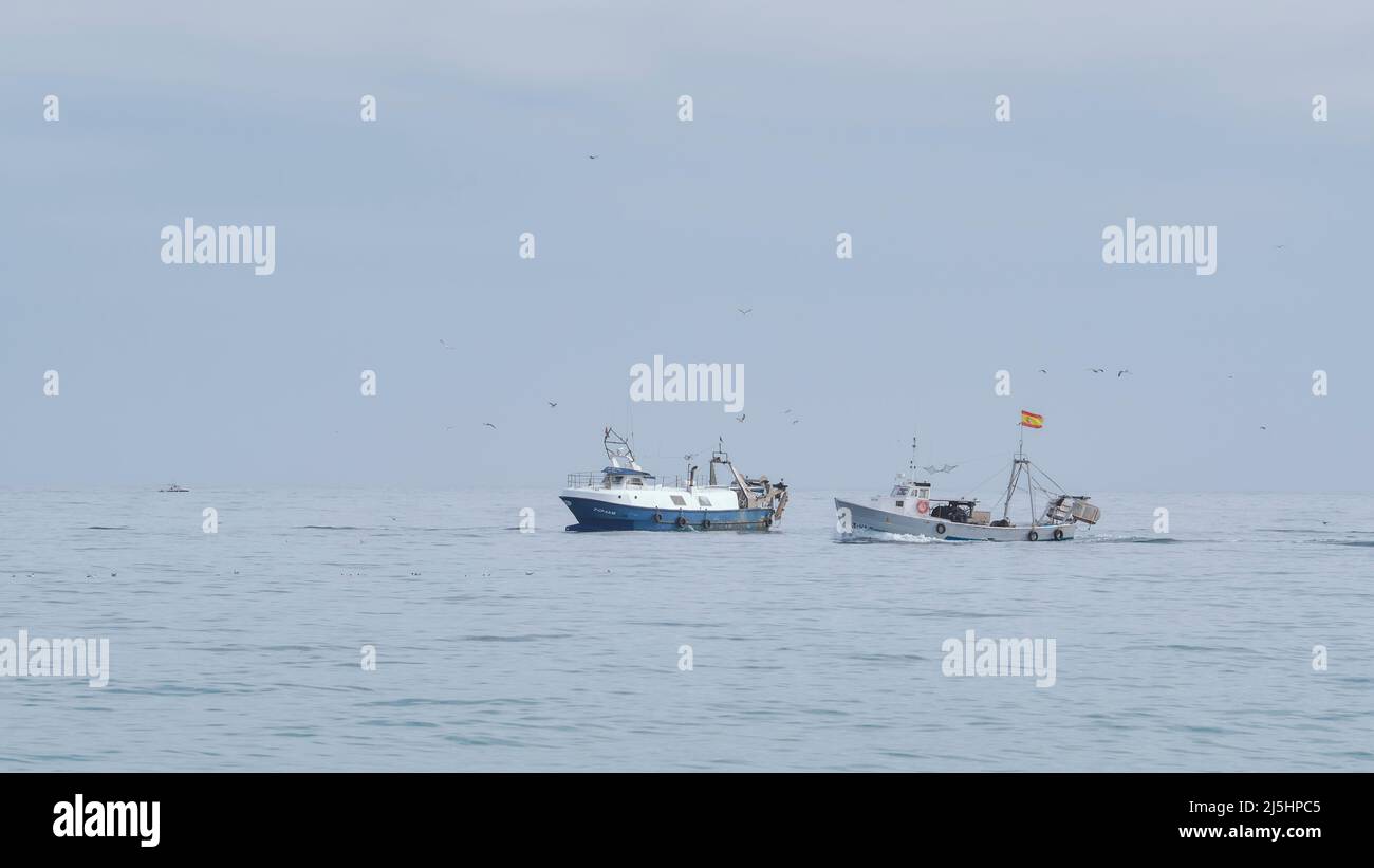 Two fishing boats hi-res stock photography and images - Alamy