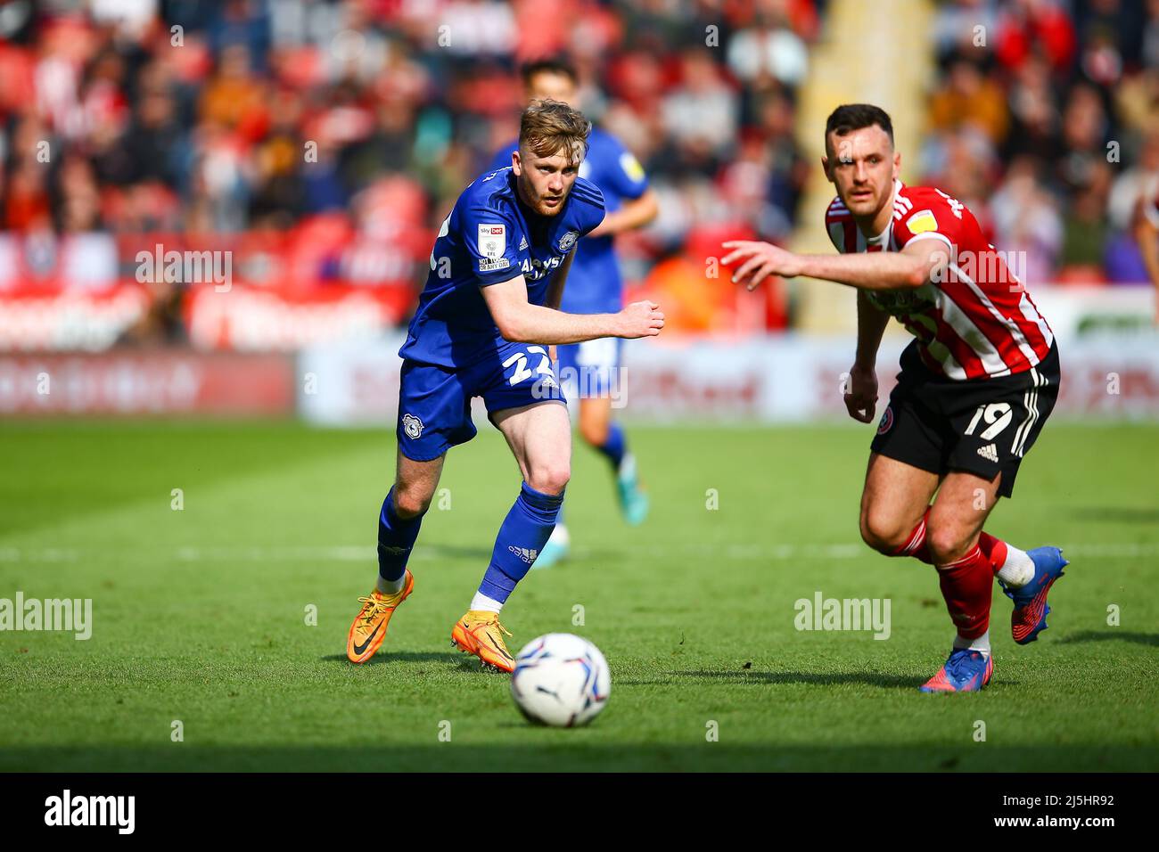 Bramall Lane, Sheffield, England - 23 April 2022 Tommy Doyle (22) of Cardiff City tries to get past Jack Robinson (19) of Sheffield United - during the game Sheffield United v Cardiff City, Sky Bet Championship 2021/22, Bramall Lane, Sheffield, England - 23 April 2022  Credit: Arthur Haigh/WhiteRosePhotos/Alamy Live News Stock Photo