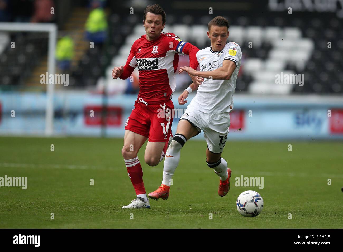 Swansea, UK. 23rd Apr, 2022. Hannes Wolf of Swansea City (r) and Jonny Howson of Swansea city (l) in action. EFL Skybet championship match, Swansea city v Middlesbrough at the Swansea.com Stadium in Swansea on Saturday 23rd April 2022. this image may only be used for Editorial purposes. Editorial use only, license required for commercial use. No use in betting, games or a single club/league/player publications. pic by Andrew Orchard/Andrew Orchard sports photography/Alamy Live news Credit: Andrew Orchard sports photography/Alamy Live News Stock Photo