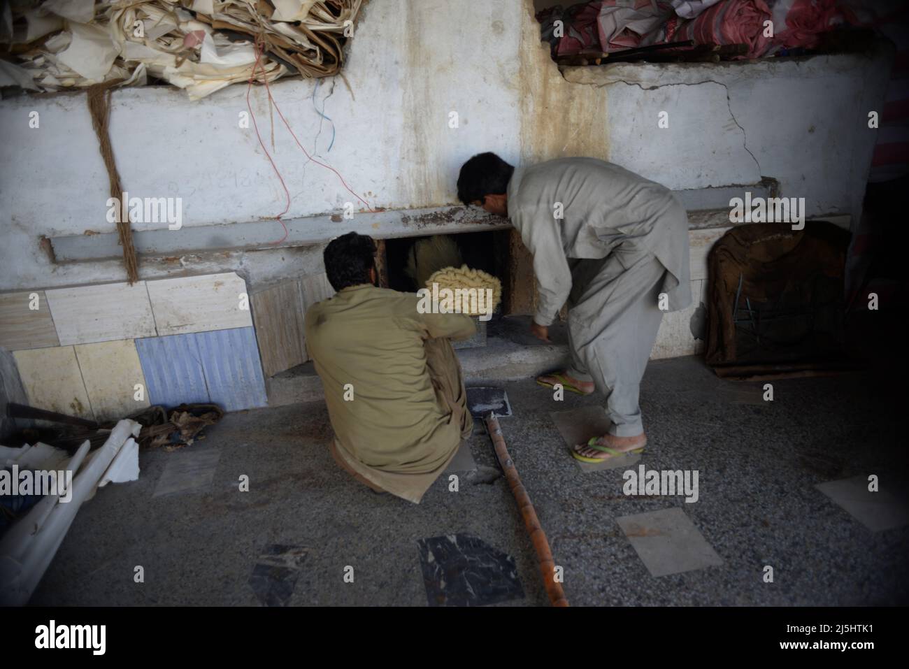 Rawalpindi, Pakistan. 23rd Apr, 2022. Worker arranges rice vermicelli