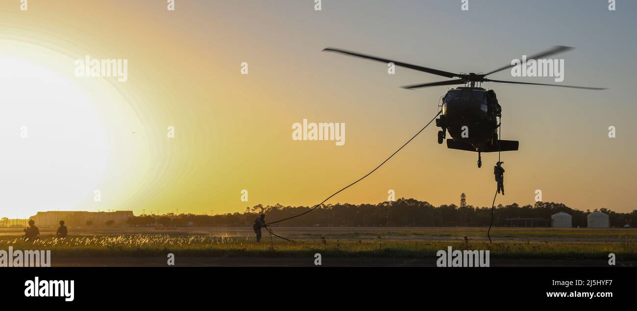 U.S. special operations service members participate in Fast Rope ...