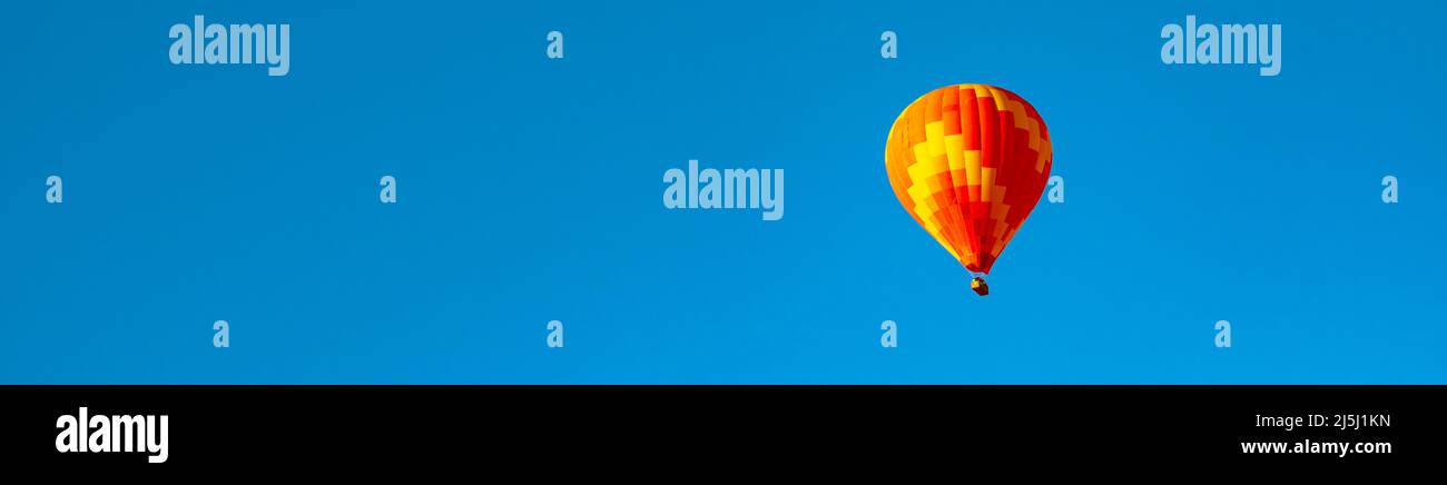 Hot air Balloon banner background photo. Balloonin activity or festival concept. Stock Photo