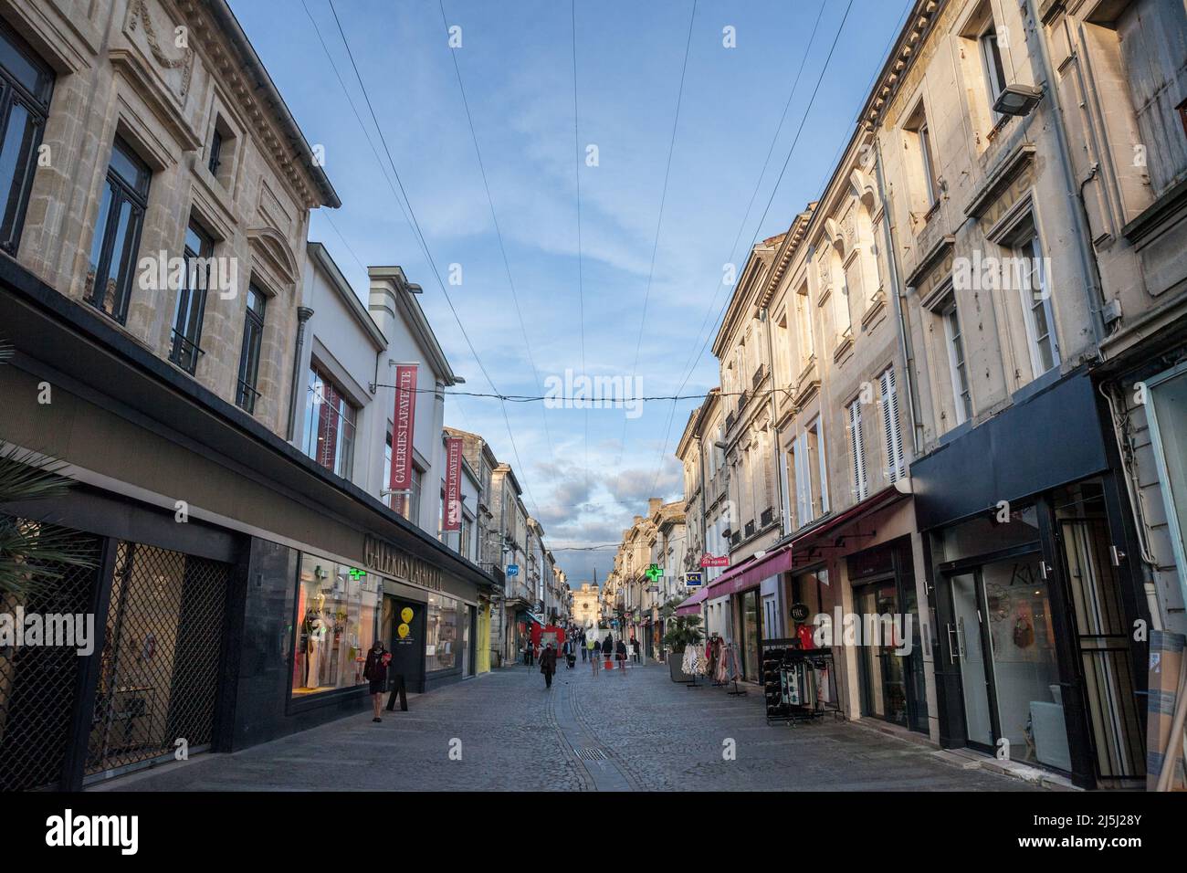 Picture of the cityscape of Libourne, France, with a focus on rue Montesquieu street, a pedestrian street of the city center. Libourne is a commune in Stock Photo