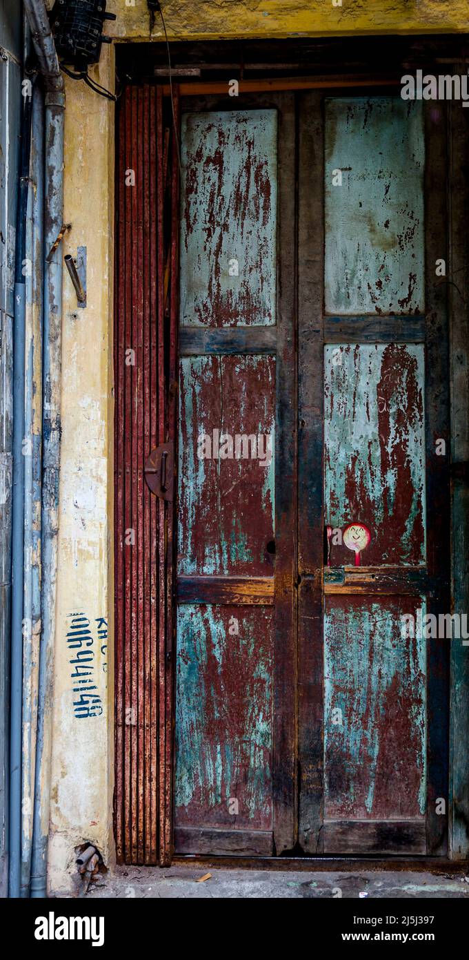 A window in an alley in Hanoi, Vietnam. Stock Photo