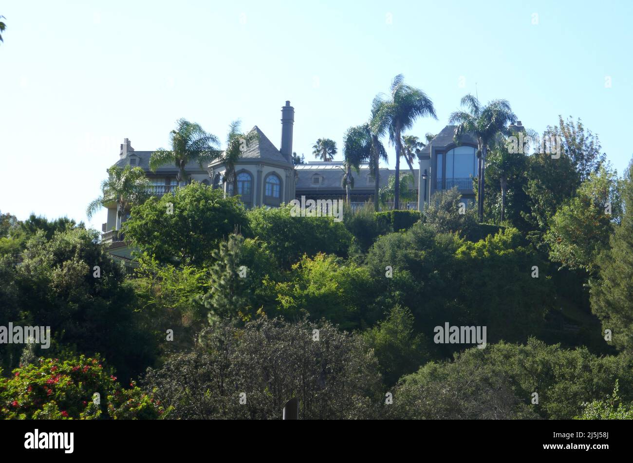 Beverly Hills, California, USA 15th April 2022 Producer Aaron Spelling's Former home The Manor, $165 Million house at 594 S. Mapleton Drive on April 15, 2022 in Beverly Hills, California, USA. Its the Largest House in Los Angeles County with 123 Rooms, 27 bathrooms, 14 Bedrooms, Screening Room, Bowling Alley, Gym, tennis court, pool. Constructed in 1988 for Aaron Spelling then owned by Brtish Heiress Petra Ecclestone, daughter of Formula One Racing Magnate Bernie Ecclestone. Photo by Barry King/Alamy Stock Photo Stock Photo