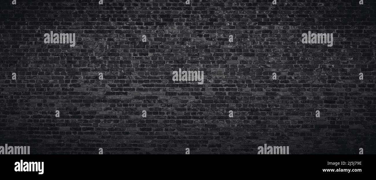 Black or dark gray brick wall texture background Stock Photo