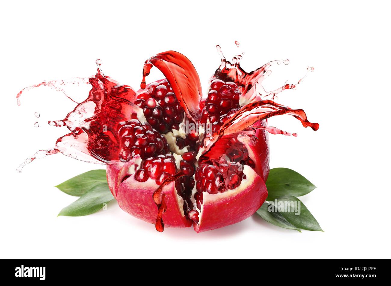 Can opener and pomegranate - open pomegranate for juice Stock Photo - Alamy