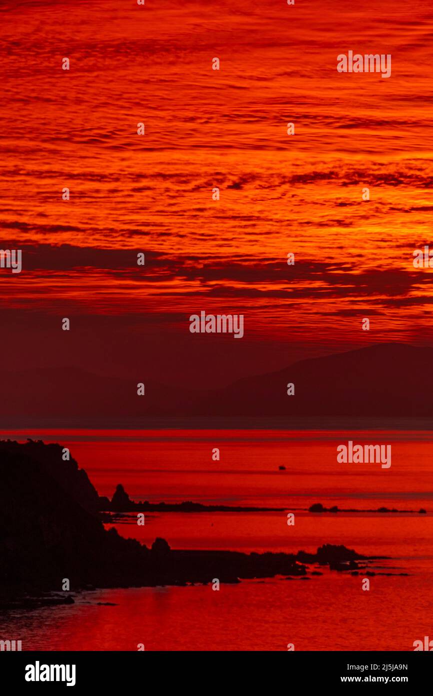 Red sunset over Cook Strait, from Titahi Bay, Porirua, Wellington