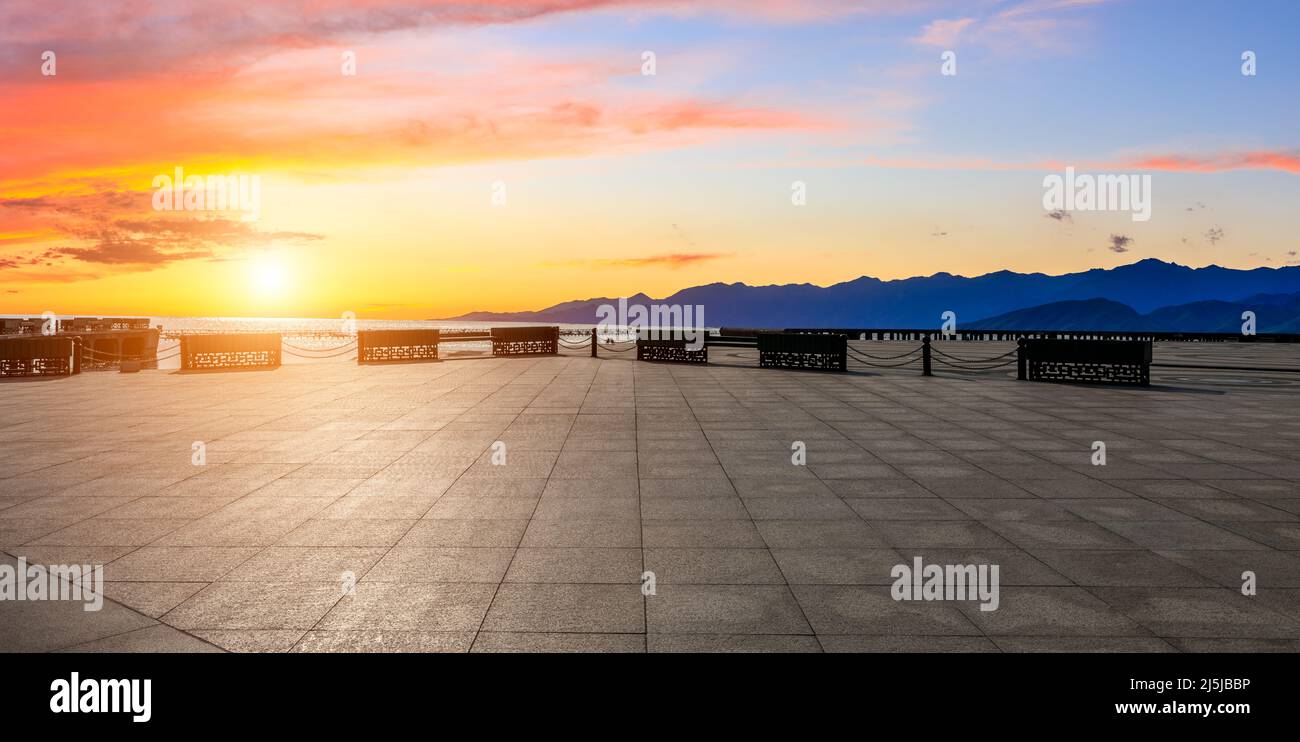 Empty square floor and mountain with sky cloud landscape at sunrise Stock Photo
