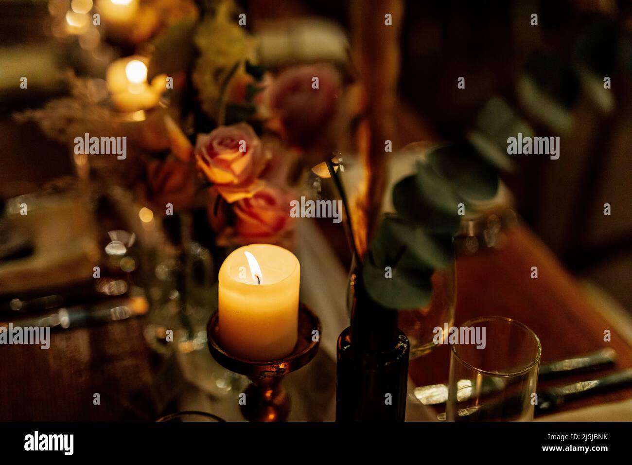 Luxury table settings for fine dining with and glassware, beautiful blurred background. For