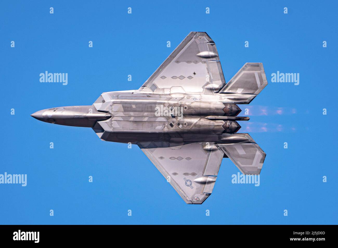 Santiago, Chile. 3rd Apr, 2022. U.S. Air Force Maj. Joshua Caboâ Gunderson, F-22 Raptor Demonstration Team commander and pilot, initiates a minimum radius turn during rehearsal for the 2022 FIDAE Air & Trade Show, April 3, 2022 in Santiago, Chile. The F-22 Raptor's two Pratt and Whitney F119 Turbofan engines bring a combined 70,000 pounds of thrust in combination with two-dimensional thrust vectoring to enable maximum maneuverability for the multi-role air-to-air stealth fighter. Credit: U.S. Air Force/ZUMA Press Wire Service/ZUMAPRESS.com/Alamy Live News Stock Photo