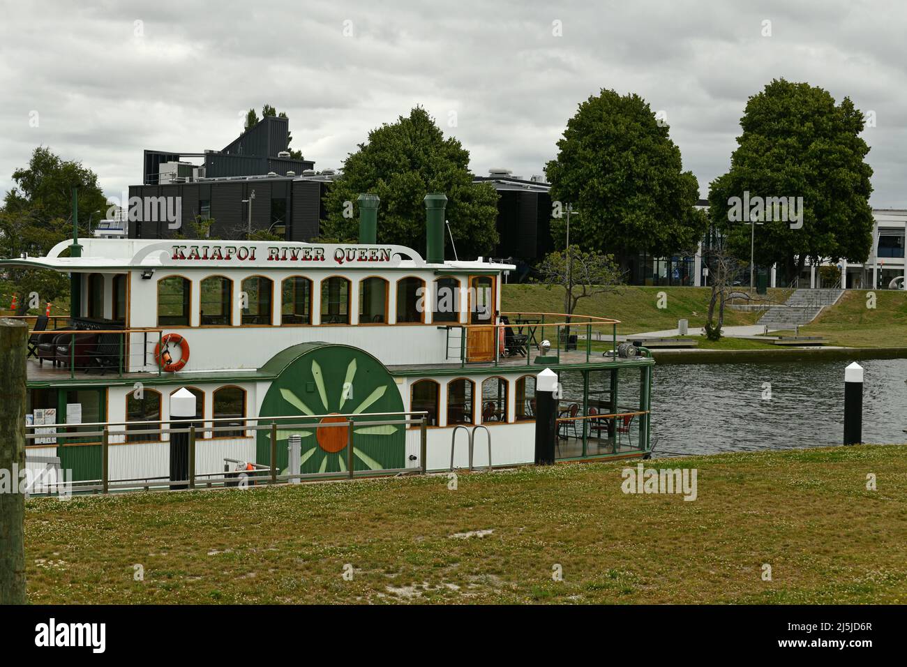 KAIAPOI, NEW ZEALAND, JANUARY 12, 2022: The Kaiapoi River Queen, a tourist attraction and floating restaurant, in the Kaiapoi River Stock Photo