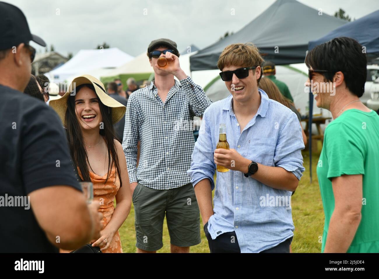 KUMARA, NEW ZEALAND, JANUARY 8, 2022; racegoers enjoy their day out at the Gold Nuggets competition at the Kumara Race Track, January 8, 2022 . Stock Photo