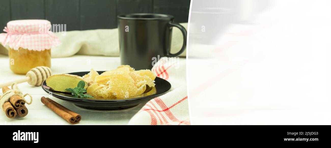 Three kinds of ginger ground spice fresh and candied on rustic table