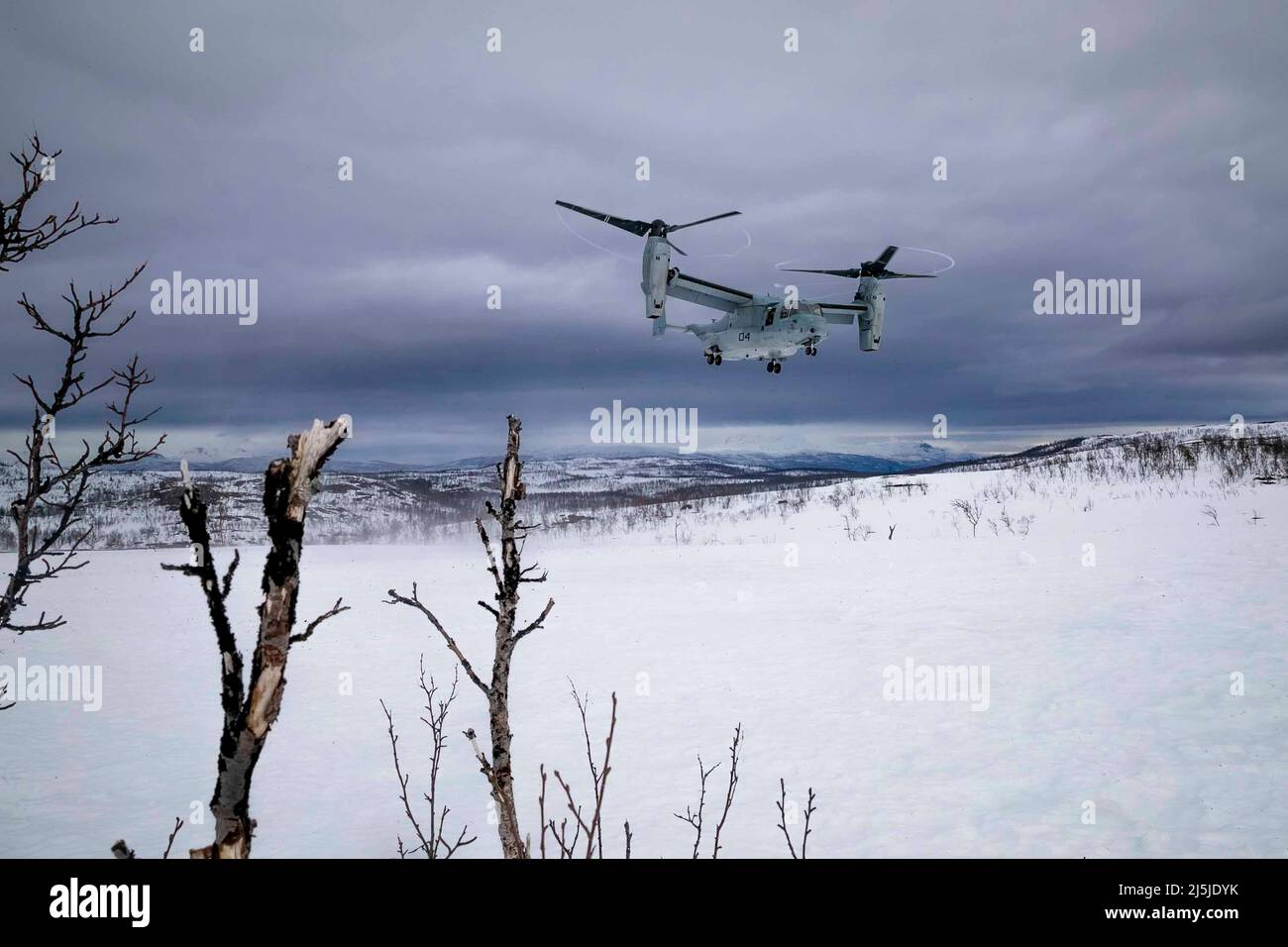 Norway. 17th Apr, 2022. A MV-22 Osprey, attached to the Aviation Combat Element, 22nd Marine Expeditionary Unit, lands in a field during a bilateral training event in Norway, April 17, 2022. The 22nd MEU, embarked aboard the Kearsarge Amphibious Ready Group, is participating in a bilateral training event with the Kingdom of Norway's Armed Forces to strengthen U.S. and Norway interoperability ensuring collective capabilities and steadfast partnerships among NATO allies and partners. Credit: U.S. Navy/ZUMA Press Wire Service/ZUMAPRESS.com/Alamy Live News Stock Photo
