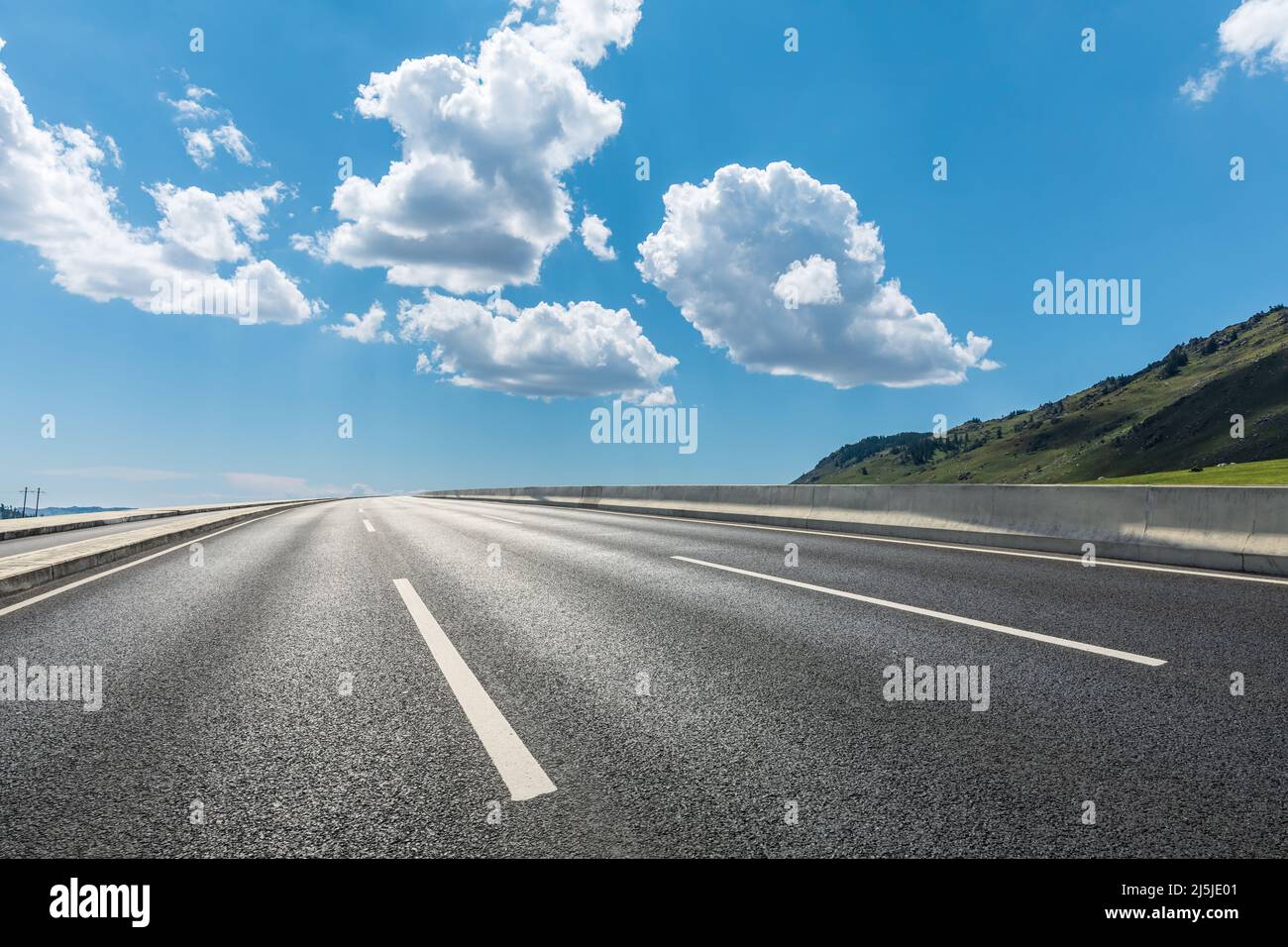 Asphalt roads and mountains with sky cloud background Stock Photo - Alamy