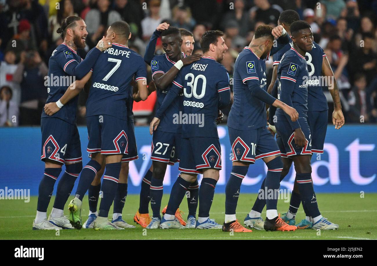 Paris Saint-Germain teammates celebrate during the Ligue 1 Paris Saint-Germain (PSG) v RC Lens football match at Parc des Princes stadium in Paris, France on April 23, 2022. Paris Saint-Germain have won the Ligue 1 title after drawing 1-1 with Lens on Saturday. It looked as if they might have to wait another week to confirm their victory, and were booed off at half-time after a stubborn Lens made life difficult for PSG's star-studded squad. However, the most gilded jewel of all, Lionel Messi, opened the scoring in the 68th minute to secure his first trophy since joining the club from Barcelona Stock Photo