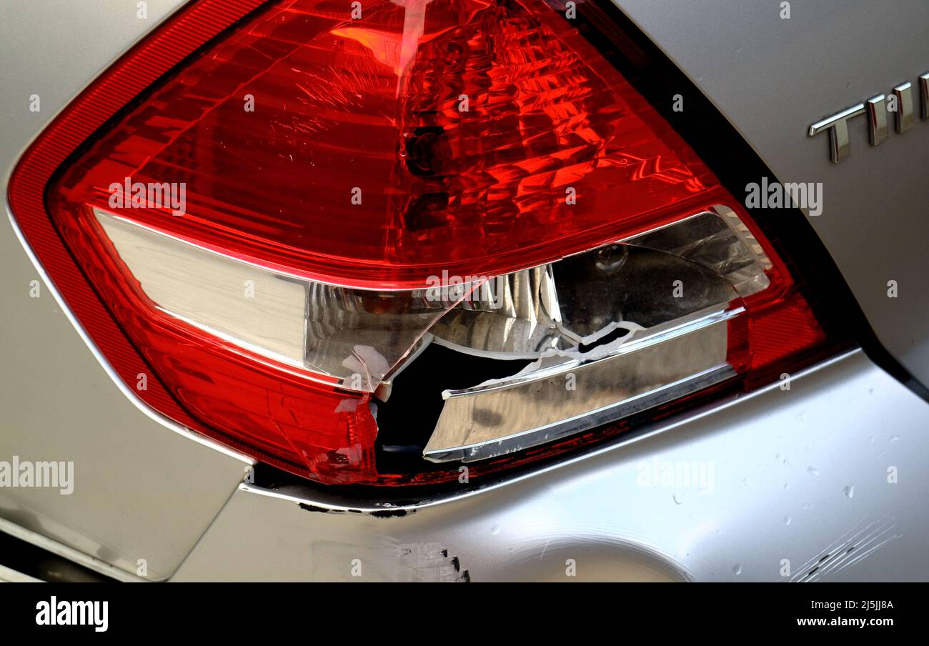 Close up of a broken tail light of a passenger vehicle car Stock Photo