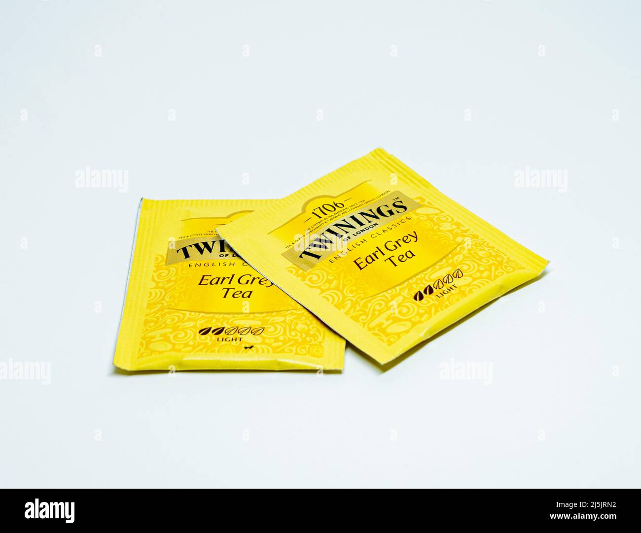 Two packets of Twinings Earl Grey tea on a white paper background. Stock Photo