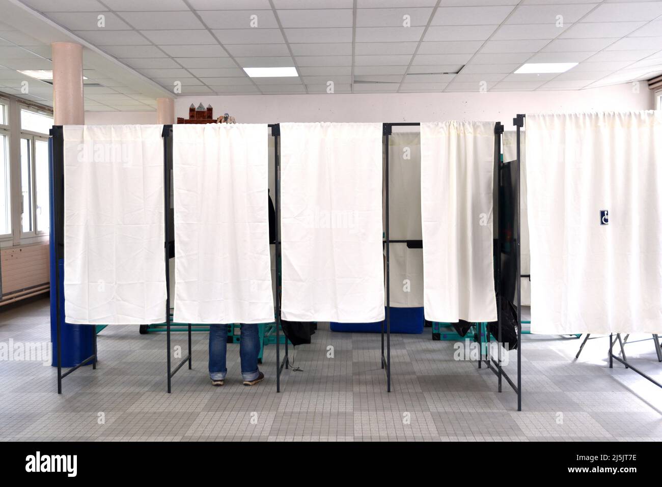 Second round of the French presidential election in Saint-Gratien, France, on April 24, 2022. In the avenue leading to the school housing the voting booths, the posters of the two candidates are torn down. Photo by Pierrick Villette/aBACAPRESS.COM Stock Photo